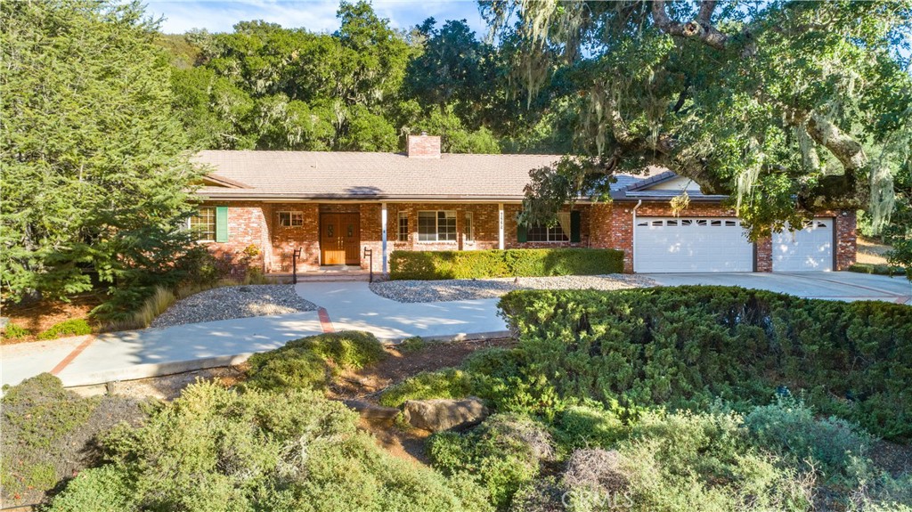 6225 Lomitas Road Atascadero, CA 93422 - Photo 1 of 1 a front view of a house with garden