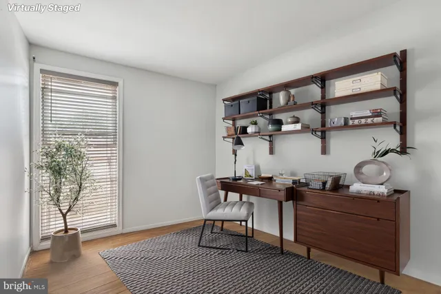 a room with a table and a window