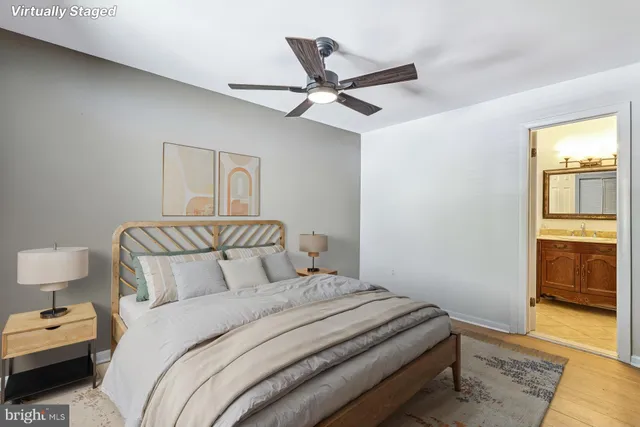 a bedroom with a bed and a view of bedroom