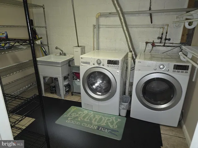 a utility room with dryer and washer