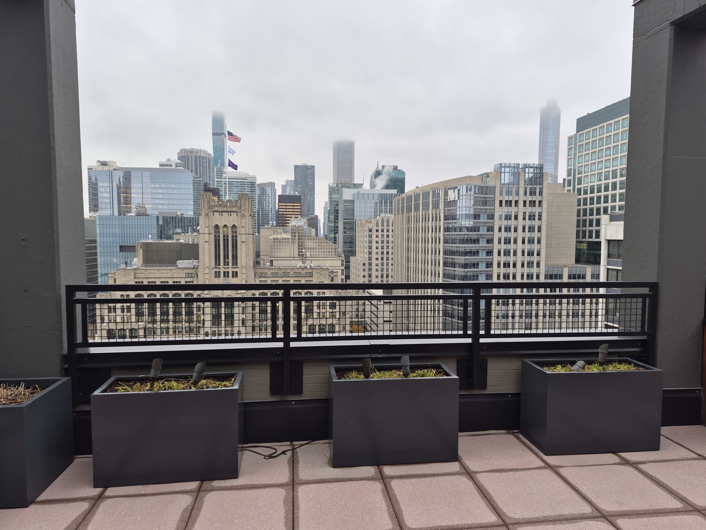 247 East Chestnut Street, Unit 1204 Chicago, IL 60611 - Photo 13 of 16 a view of a city with tall buildings