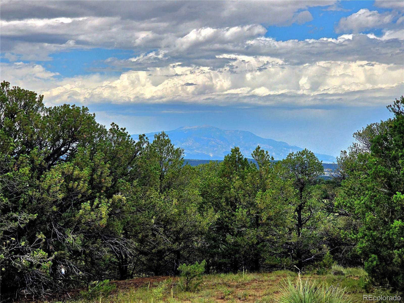 Lot 97-phase Lot 97-phase Ranch Walsenburg, CO 81089 - Photo 18 of 20 a view of a lake with a yard