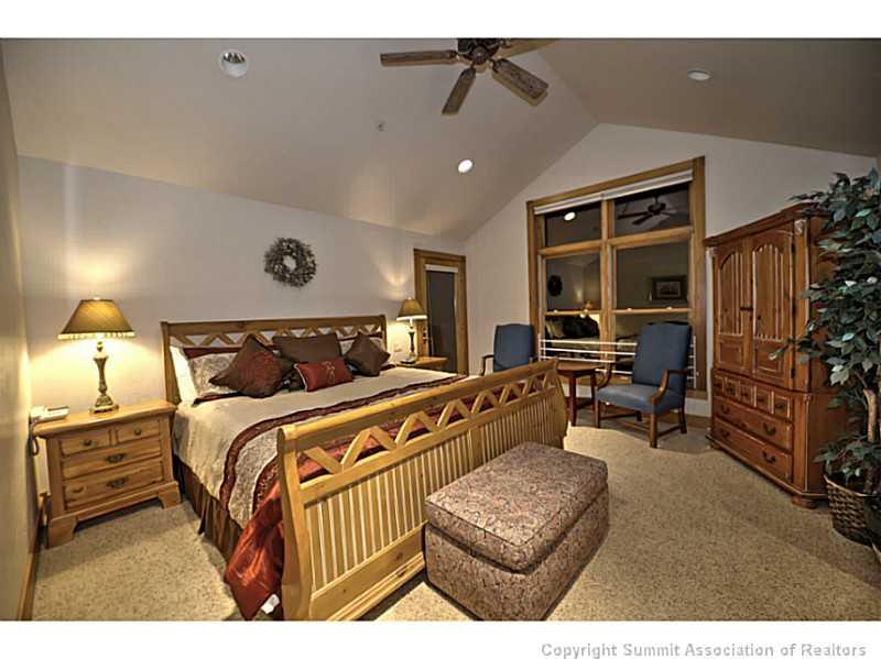70 River Run Road, Unit 202 Keystone, CO 80435 - Photo 10 of 19 a bedroom with bed and window