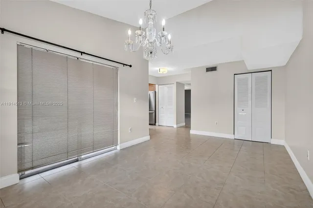 a view of a chandelier in a room