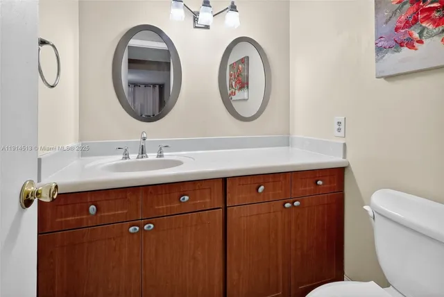 a bathroom with a toilet and a sink