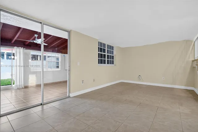 a bathroom with a toilet and shower