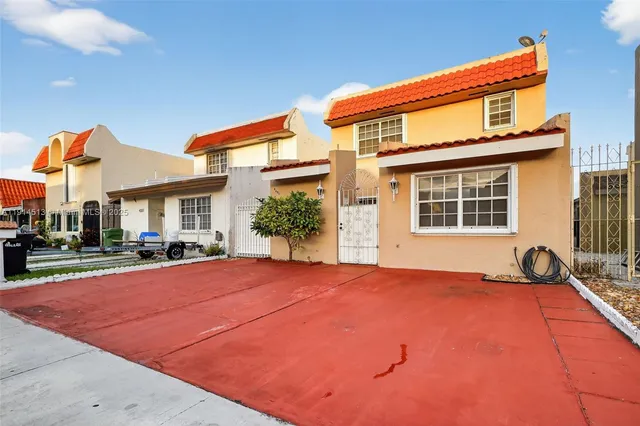 a view of a house with a patio