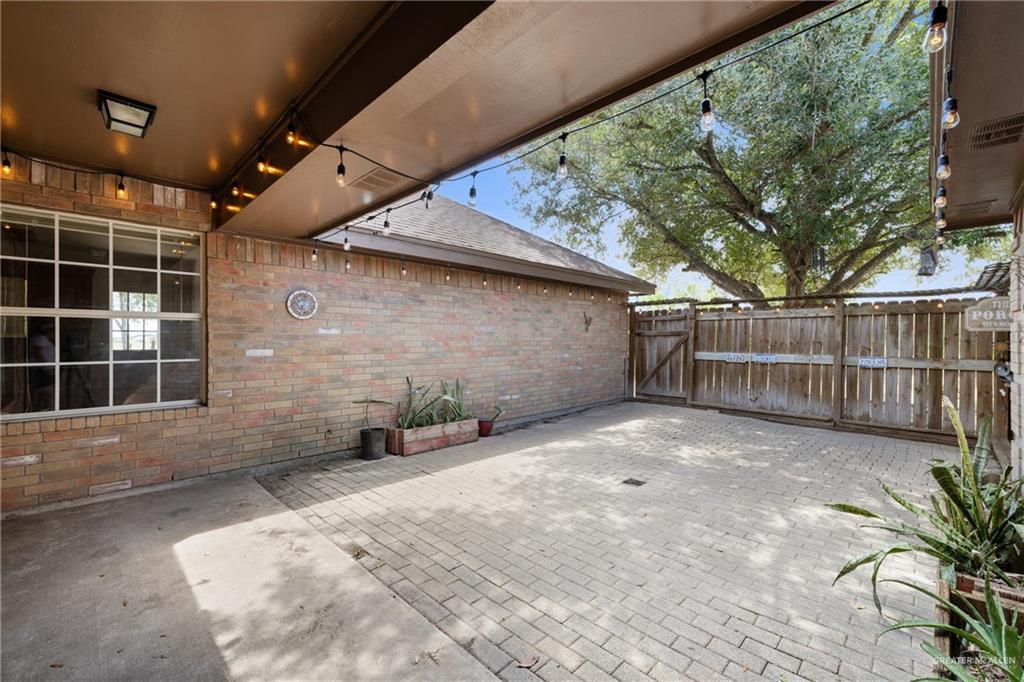 4822 East Canton Road Edinburg, TX 78542 - Photo 20 of 28 a view of backyard and wooden fence