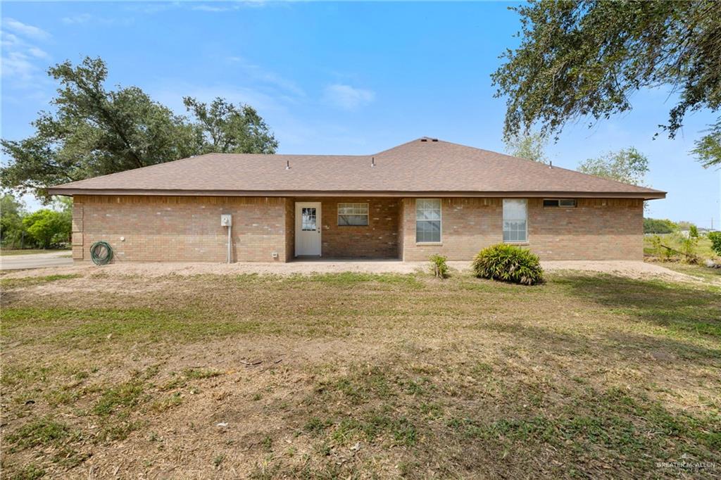 4822 East Canton Road Edinburg, TX 78542 - Photo 27 of 28 a front view of a house with garden