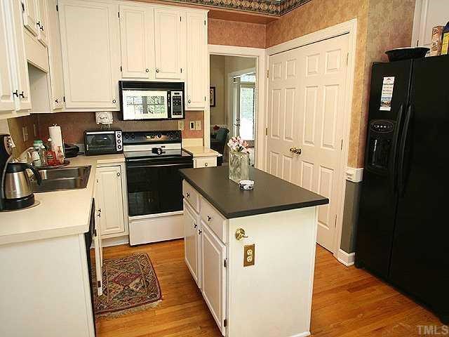 504 Crabbery Lane Raleigh, NC 27609 - Photo 4 of 8 Spacious Kitchen, Hardwood Floors, Double Pantry