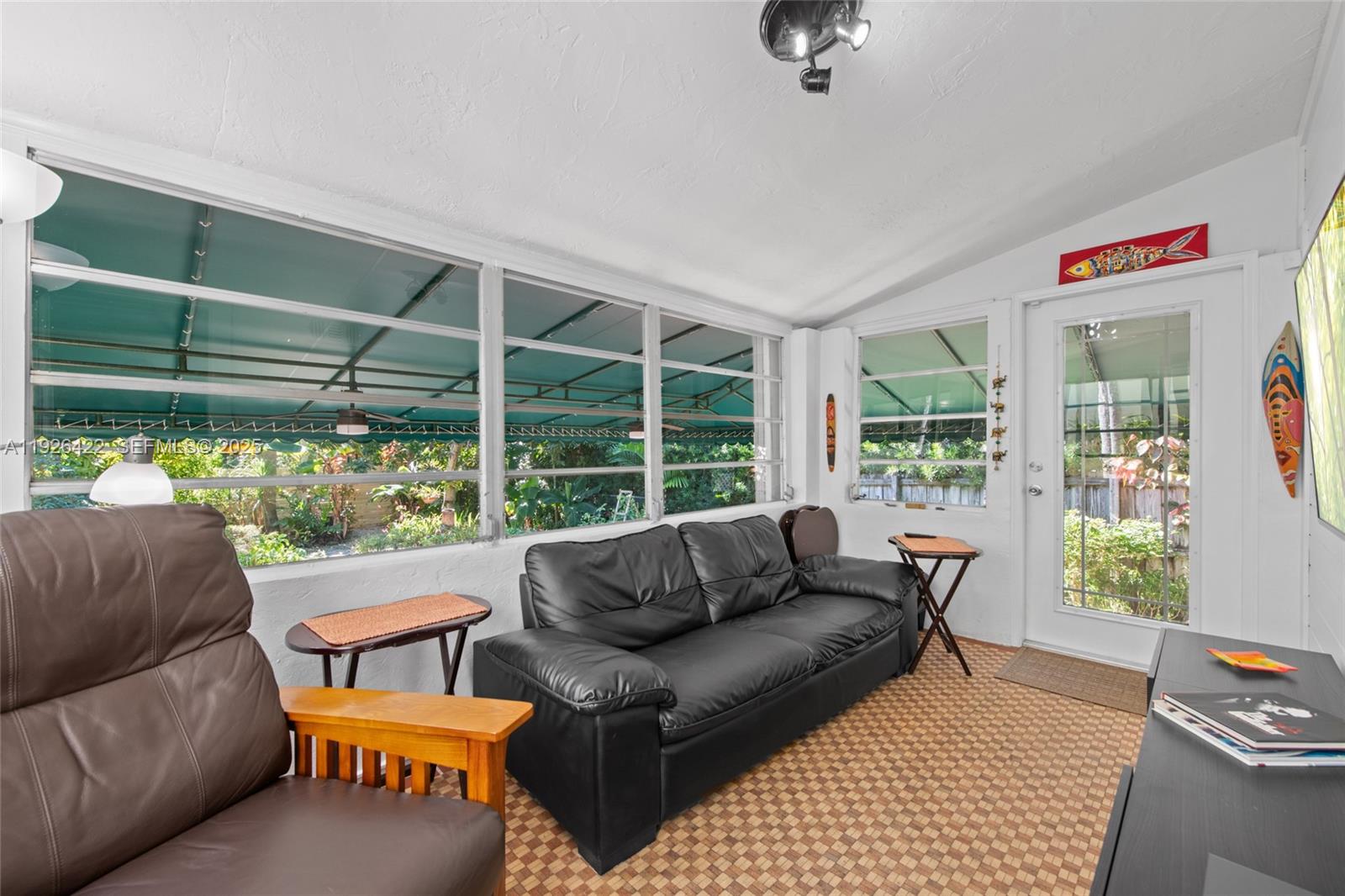 2460 Southwest 24th Street Miami, FL 33145 - Photo 14 of 36 a living room with furniture and a window