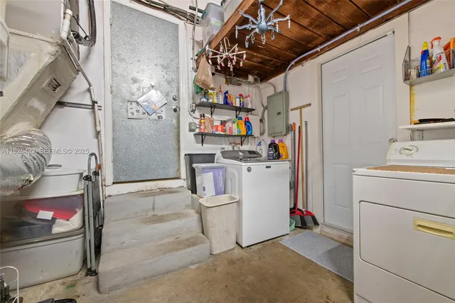a utility room with dryer and washer