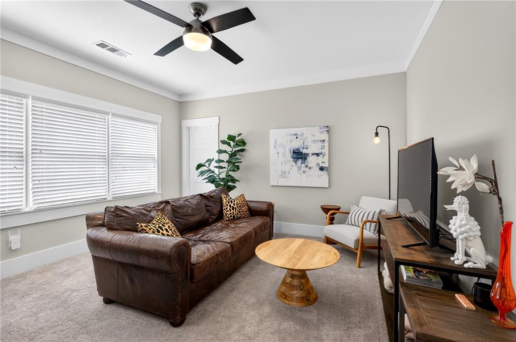 4072 Comanche Drive Tucker, GA 30084 - Photo 29 of 43 a living room with furniture and a flat screen tv