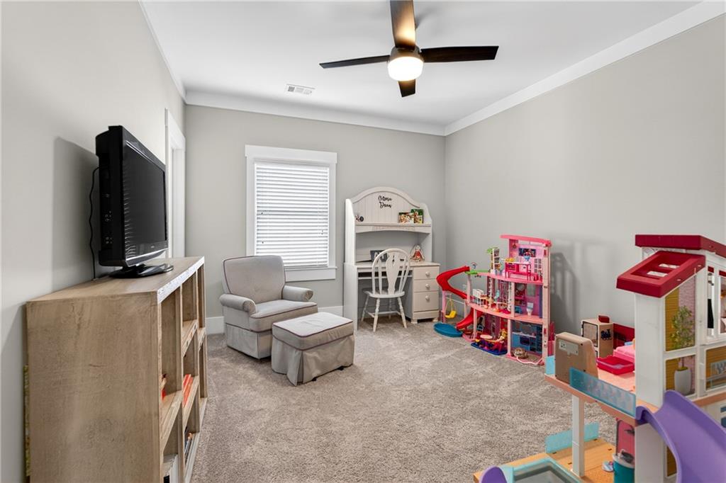 4072 Comanche Drive Tucker, GA 30084 - Photo 34 of 43 a living room with furniture and a flat screen tv