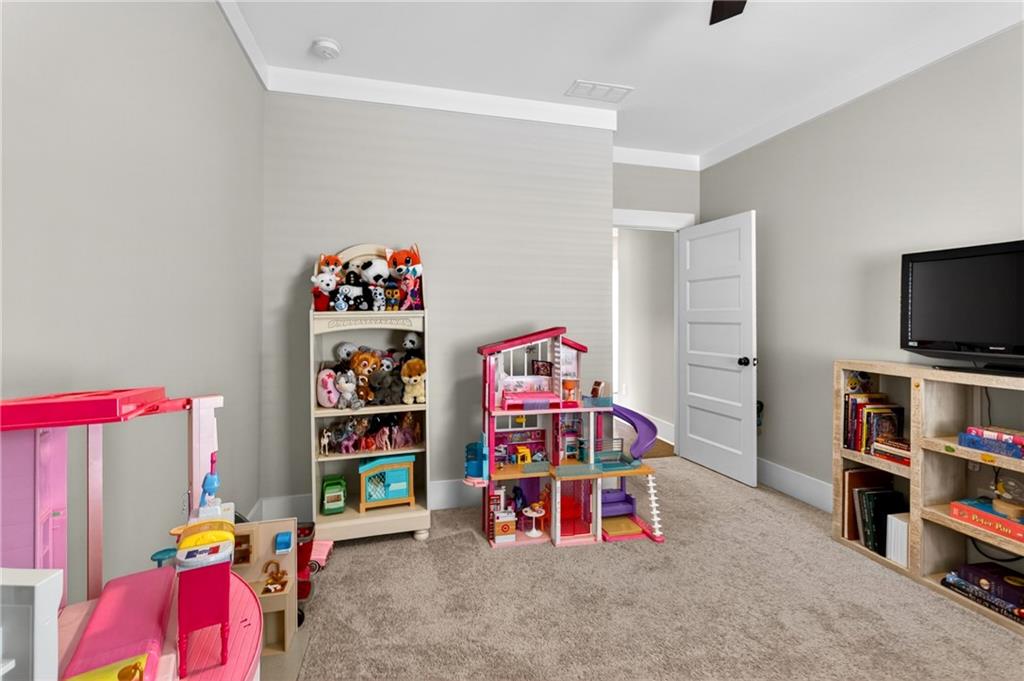 4072 Comanche Drive Tucker, GA 30084 - Photo 35 of 43 a children room with toys and a couch
