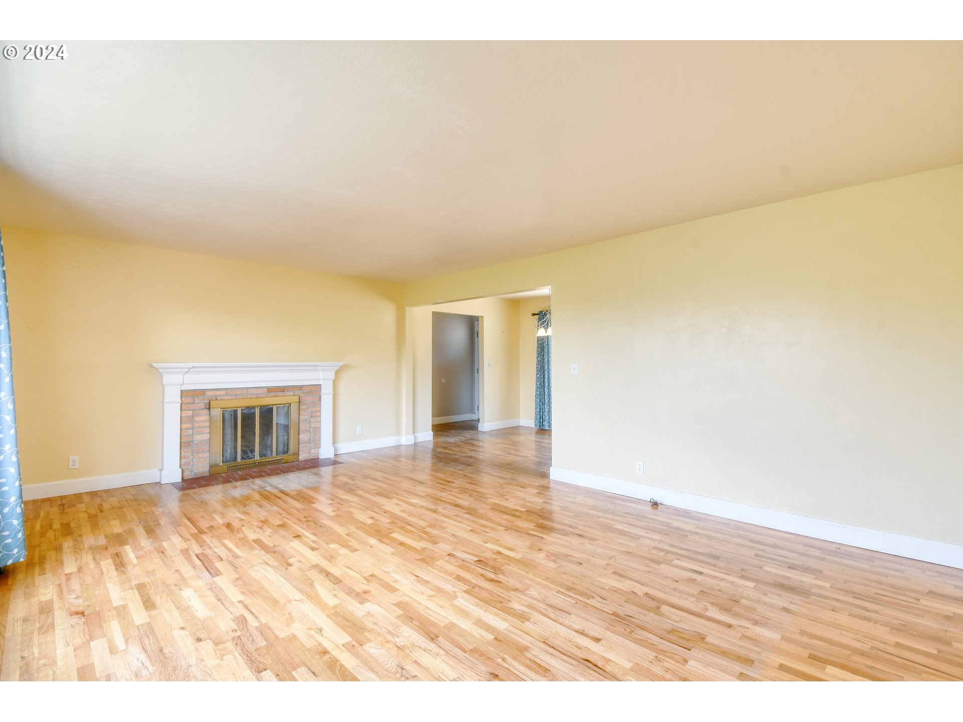 823 Northwest 5th Street Pendleton, OR 97801 - Photo 7 of 34 a view of empty room with wooden floor