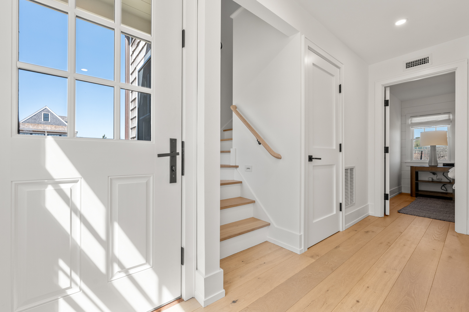 174 Cliff Road Nantucket, MA 02554 - Photo 41 of 49 a view of a hallway with staircase