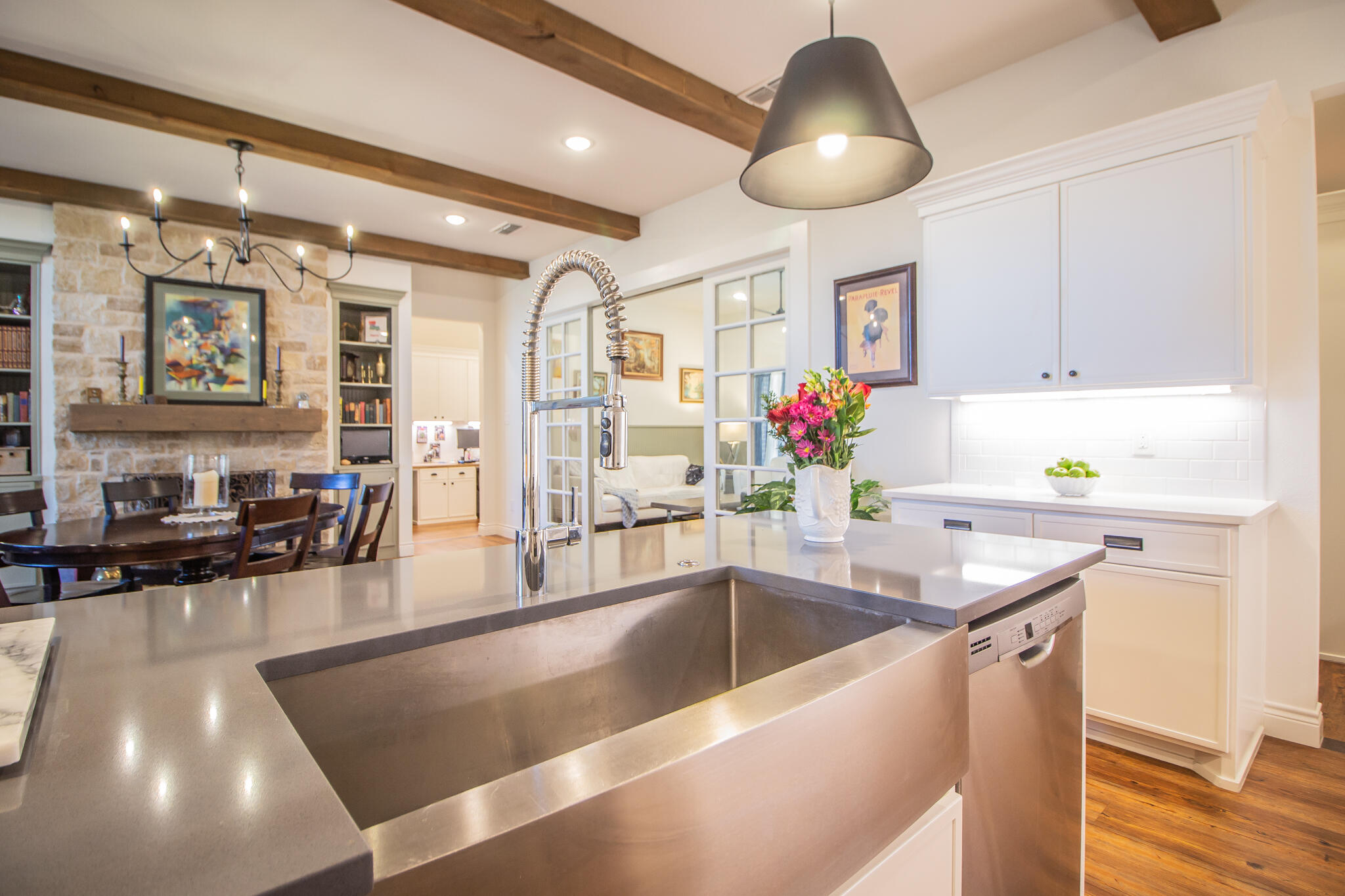 4019 137th Street Lubbock, TX 79423 - Photo 18 of 46 a kitchen with stainless steel appliances granite countertop a sink a counter space and cabinets