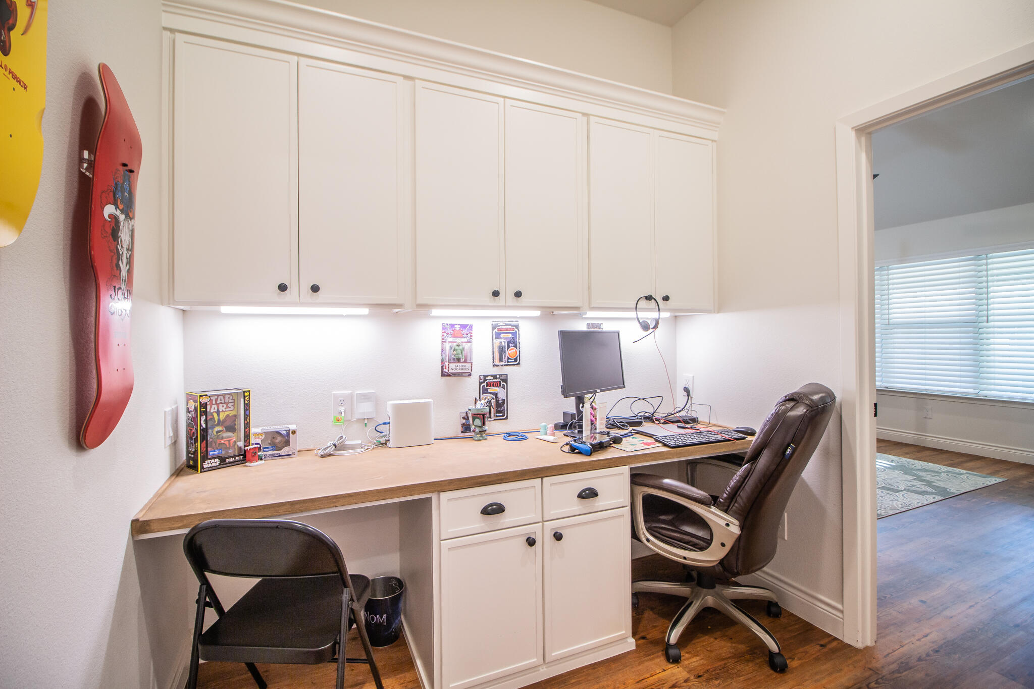4019 137th Street Lubbock, TX 79423 - Photo 24 of 46 a room with a chair and cabinets