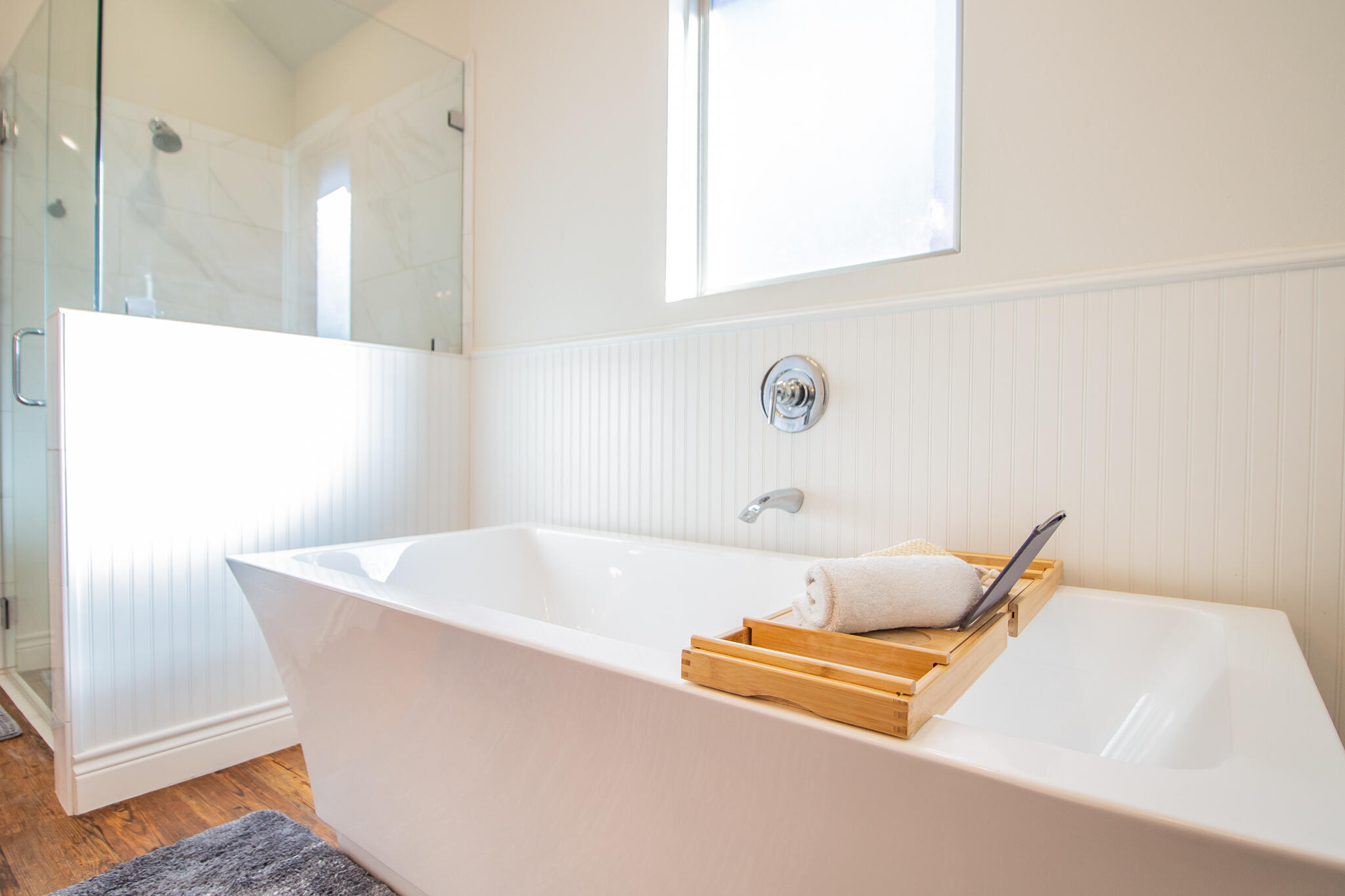4019 137th Street Lubbock, TX 79423 - Photo 31 of 46 a bathroom with a tub and a sink