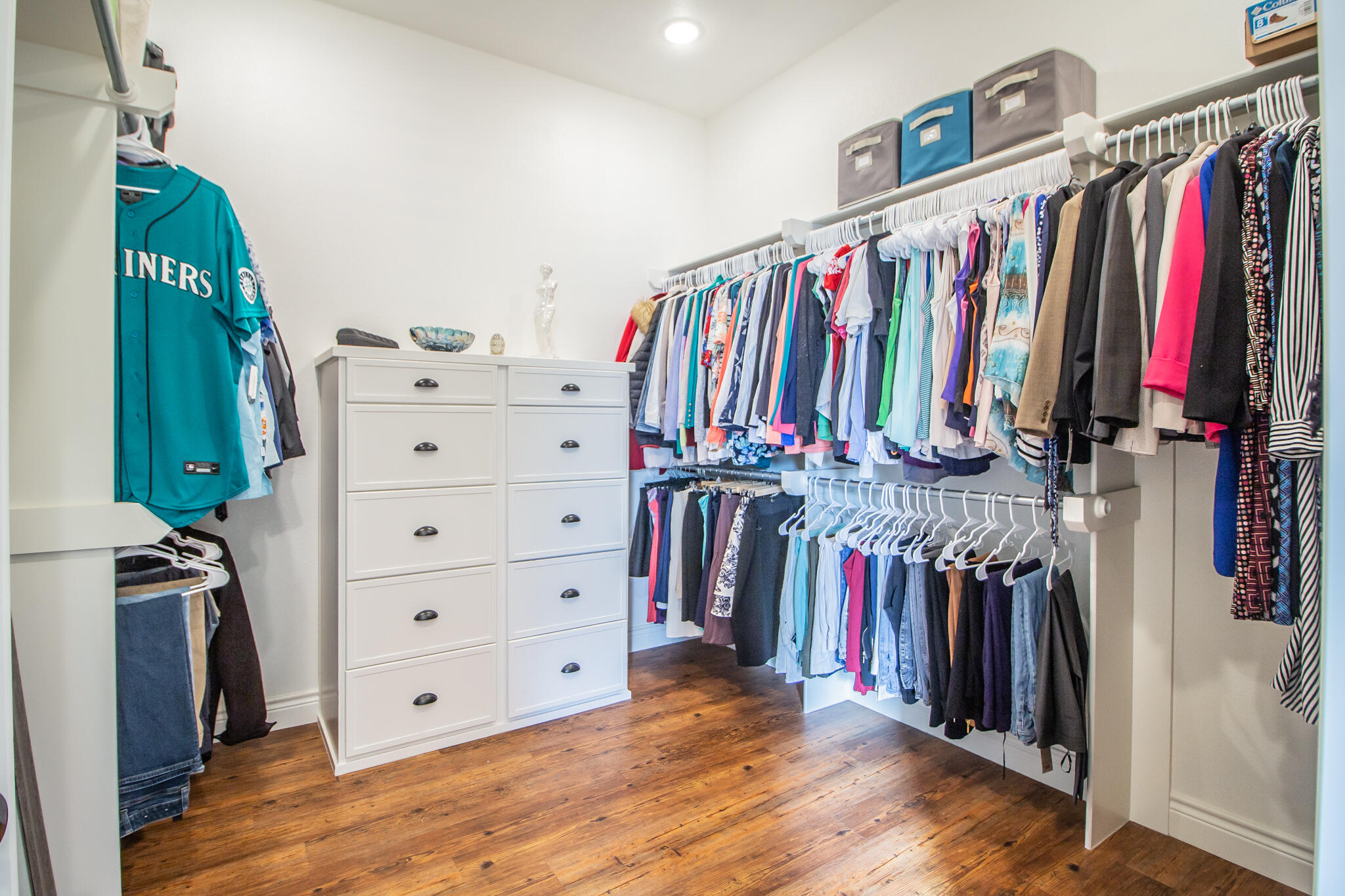 4019 137th Street Lubbock, TX 79423 - Photo 32 of 46 a view of walk in closet with clothes