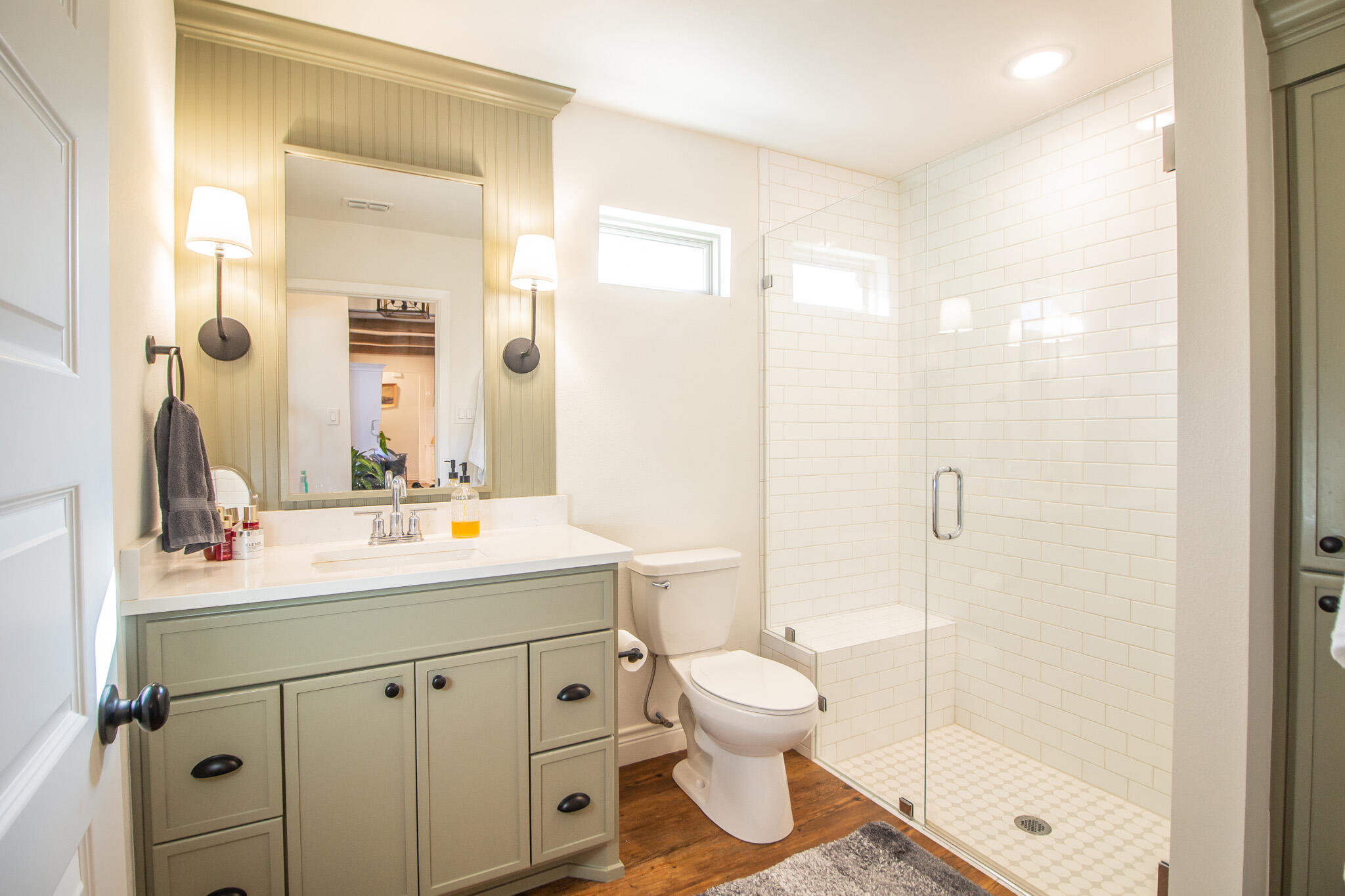 4019 137th Street Lubbock, TX 79423 - Photo 35 of 46 a bathroom with a sink mirror toilet and shower