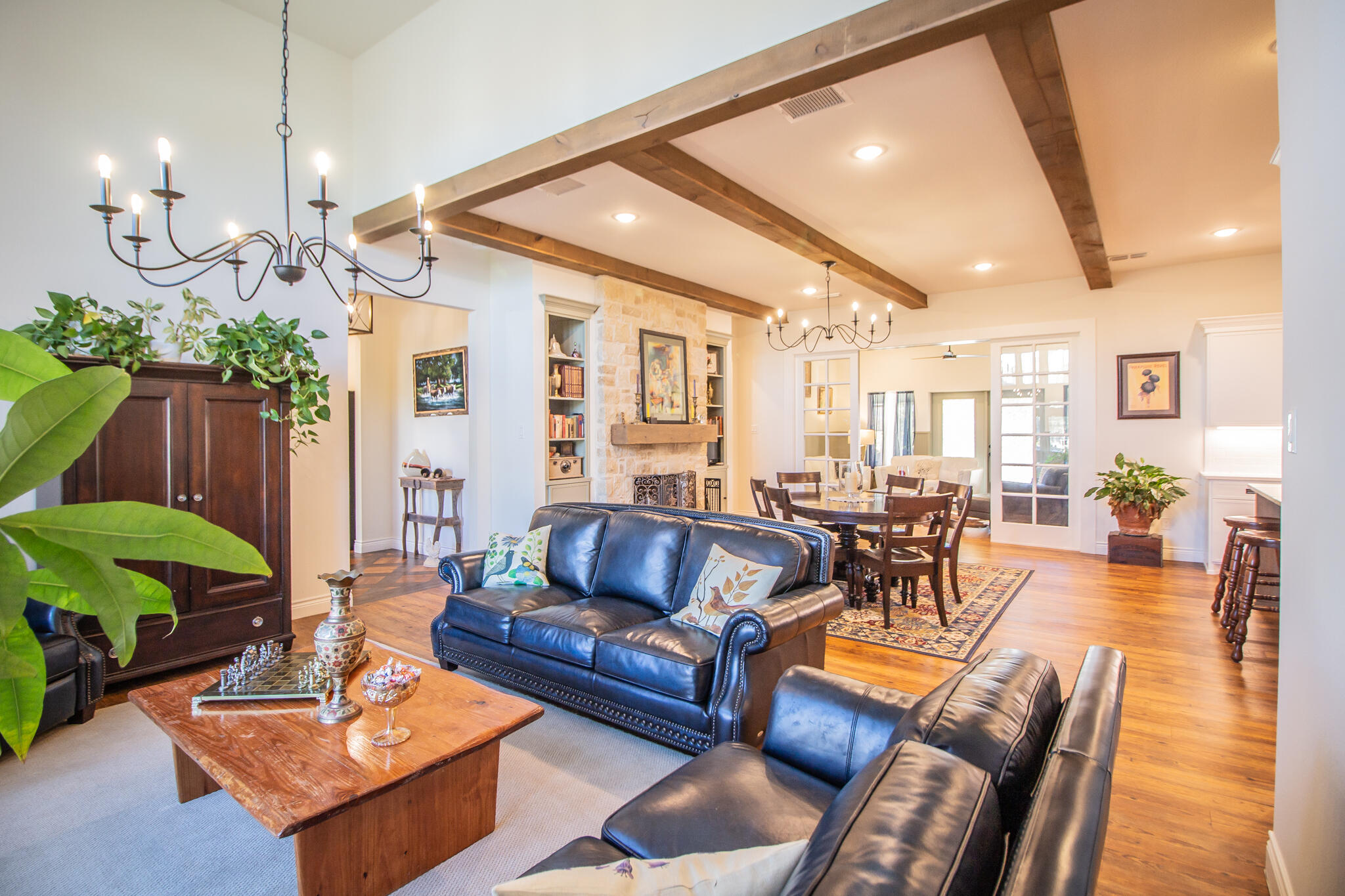 4019 137th Street Lubbock, TX 79423 - Photo 7 of 46 a living room with furniture a couch and paintings on the wall