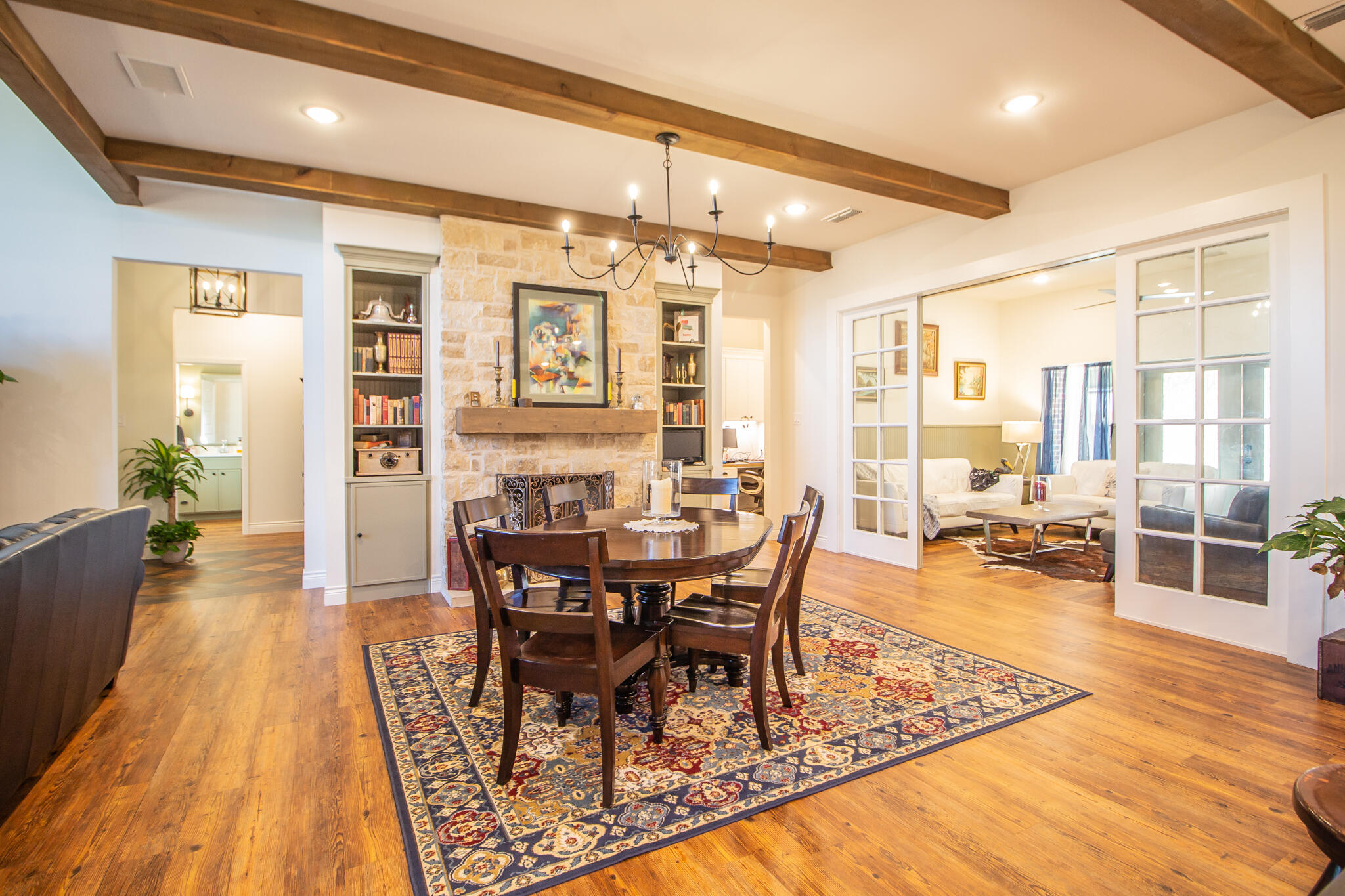 4019 137th Street Lubbock, TX 79423 - Photo 9 of 46 a view of a dining room with furniture window and wooden floor