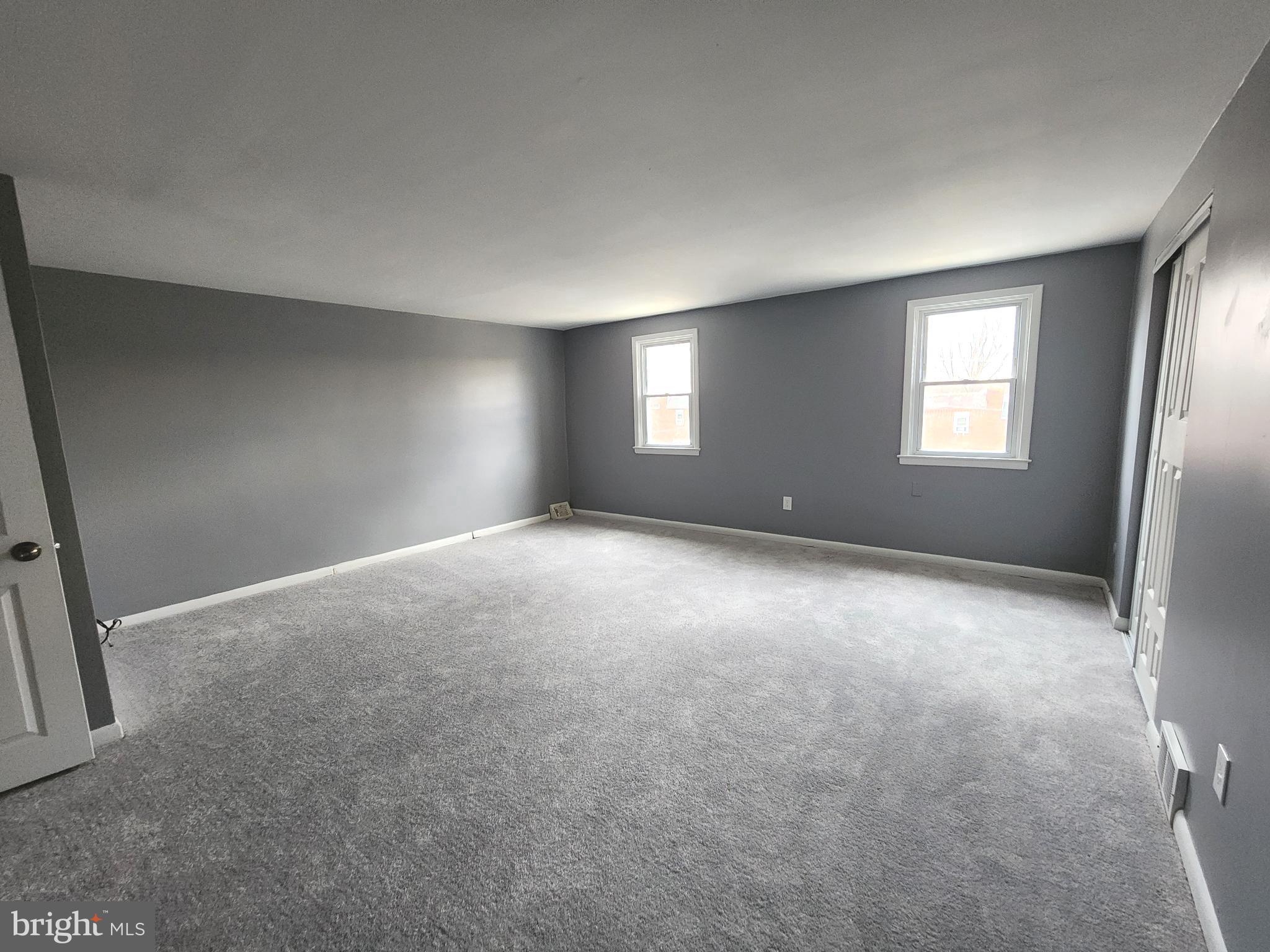1333 Adair Road Brookhaven, PA 19015 - Photo 9 of 16 a view of an empty room with window and closet area