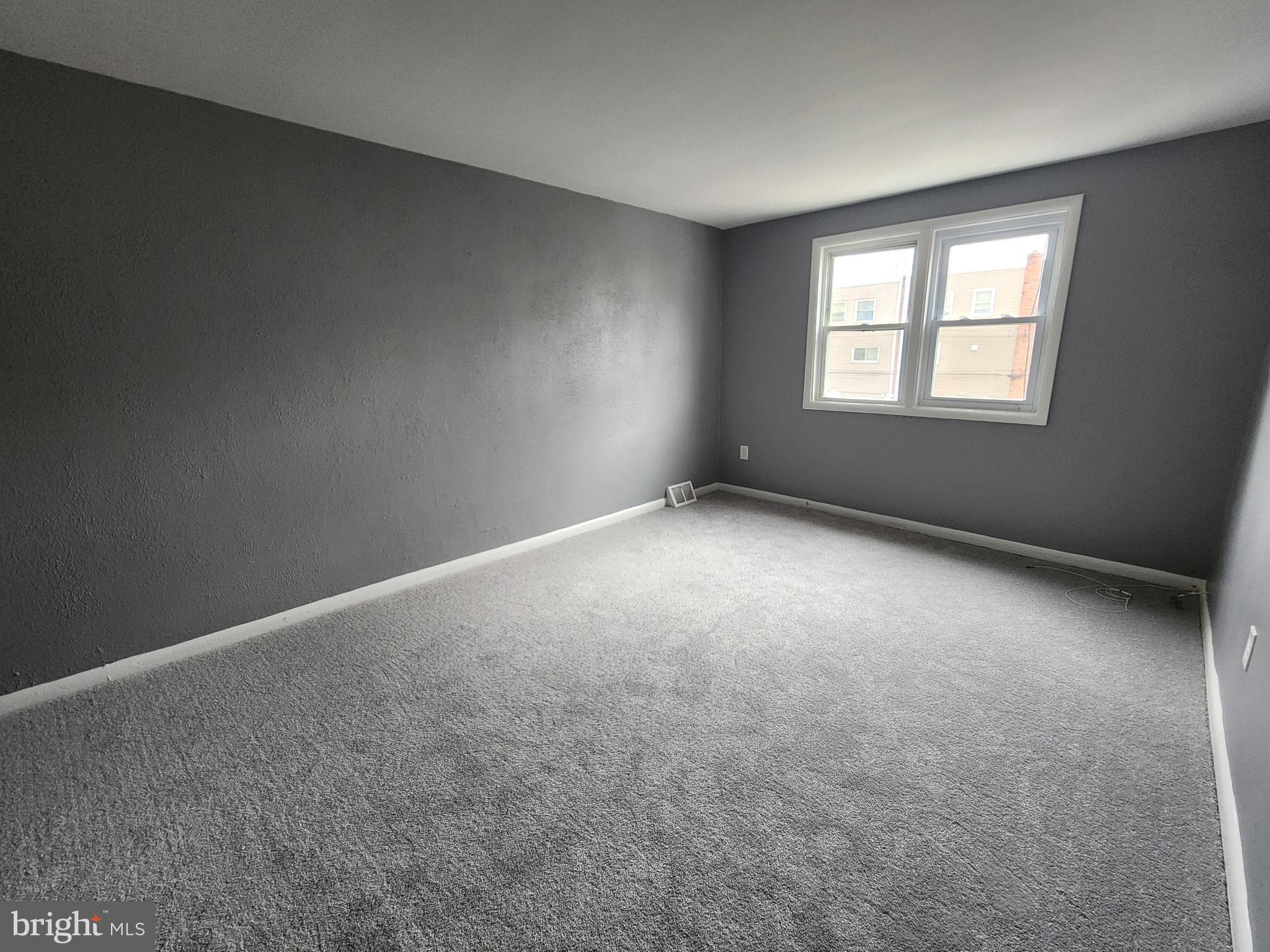 1333 Adair Road Brookhaven, PA 19015 - Photo 10 of 16 a view of an empty room with a window