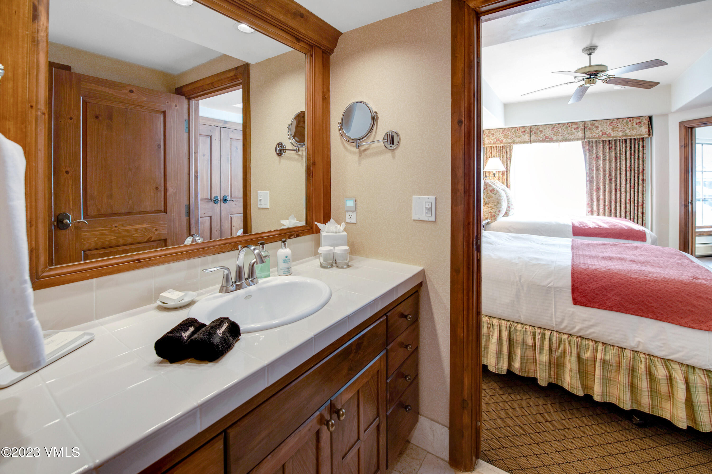 242 East Meadow Drive, Unit 1041 Vail, CO 81657 - Photo 22 of 46 a bathroom with a sink and a mirror
