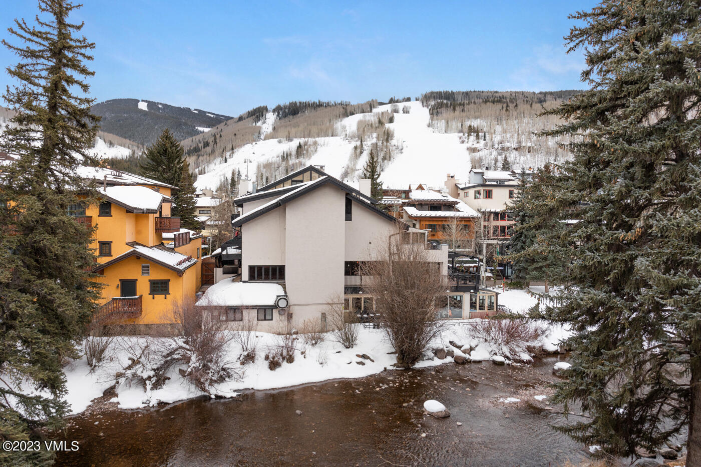 242 East Meadow Drive, Unit 1041 Vail, CO 81657 - Photo 31 of 46 a view of a house with a yard