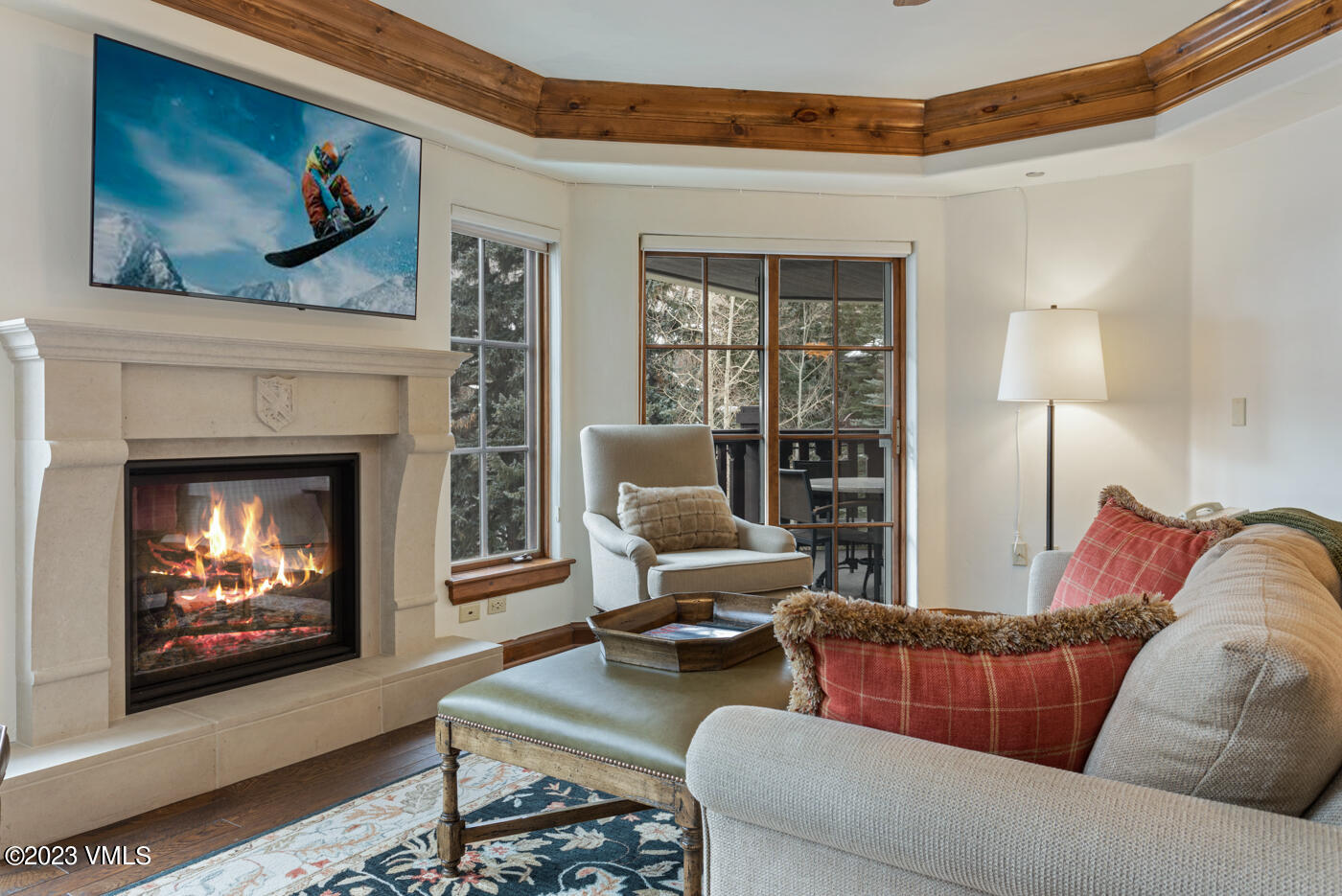 242 East Meadow Drive, Unit 1041 Vail, CO 81657 - Photo 41 of 46 a living room with furniture and a fireplace