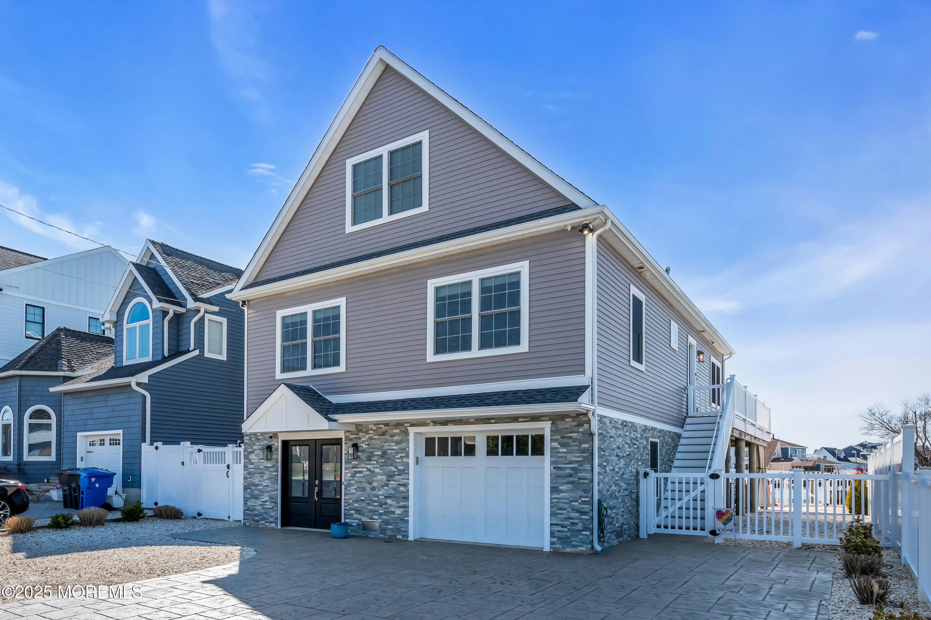 50 Pilot Road Toms River, NJ 08753 - Photo 1 of 73 a front view of a house with a garage