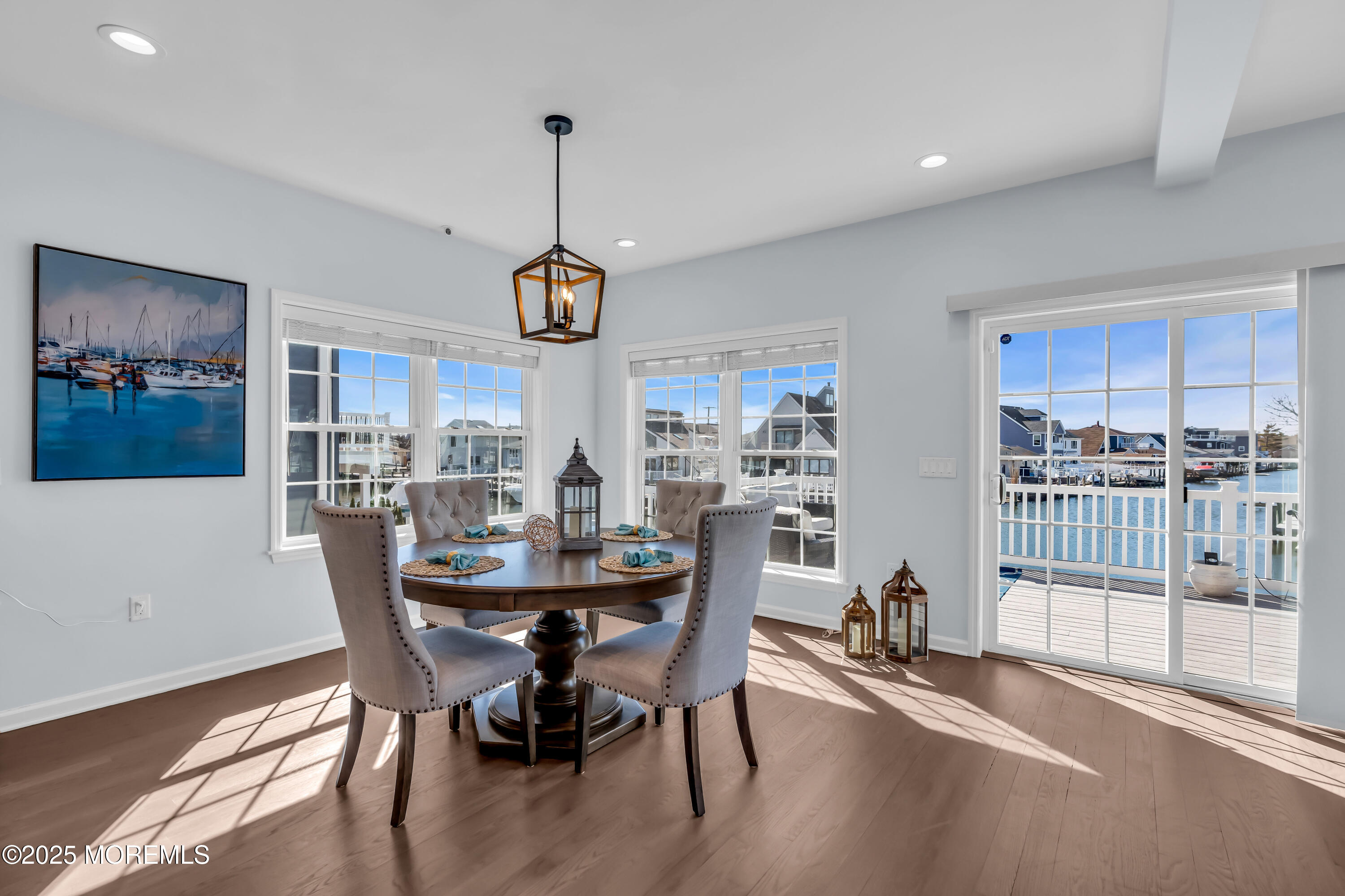 50 Pilot Road Toms River, NJ 08753 - Photo 17 of 73 a view of a dining room with furniture wooden floor and chandelier