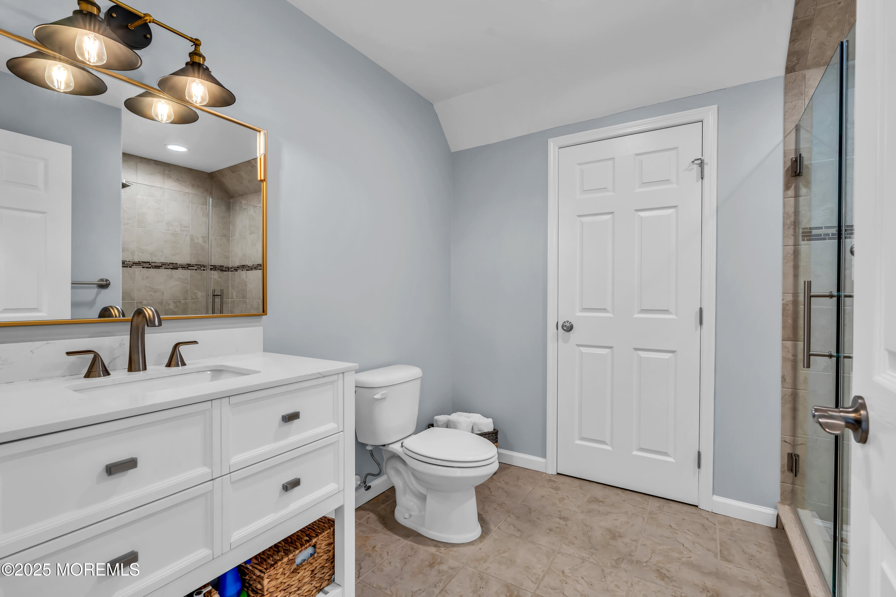 50 Pilot Road Toms River, NJ 08753 - Photo 31 of 73 a bathroom with a toilet a sink and mirror
