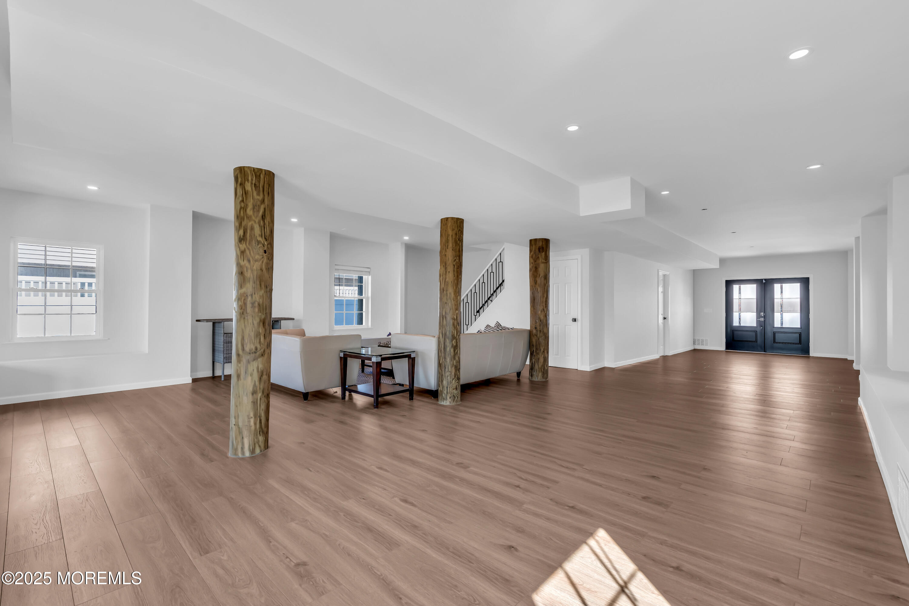 50 Pilot Road Toms River, NJ 08753 - Photo 40 of 73 a view of an empty room with window and wooden floor