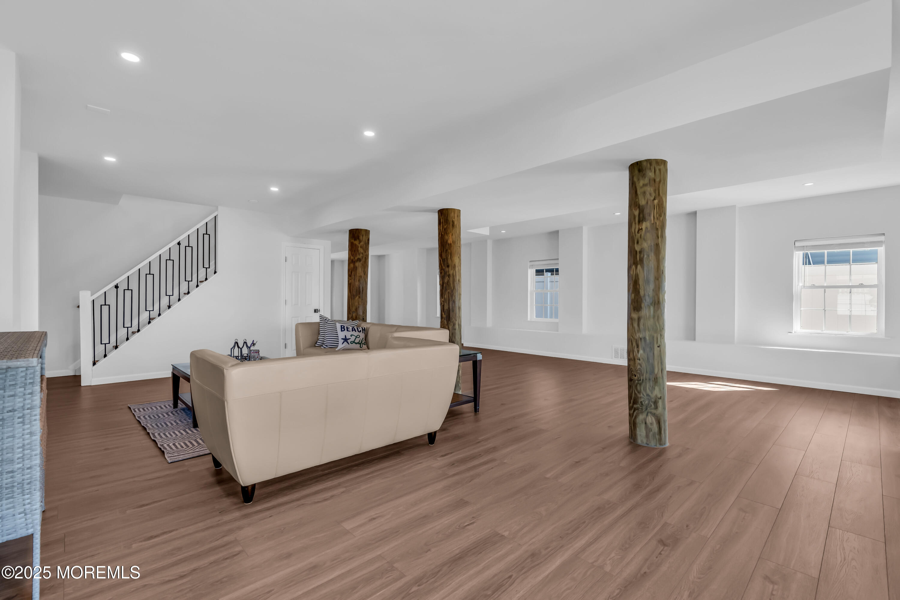 50 Pilot Road Toms River, NJ 08753 - Photo 42 of 73 a living room with furniture and a wooden floor