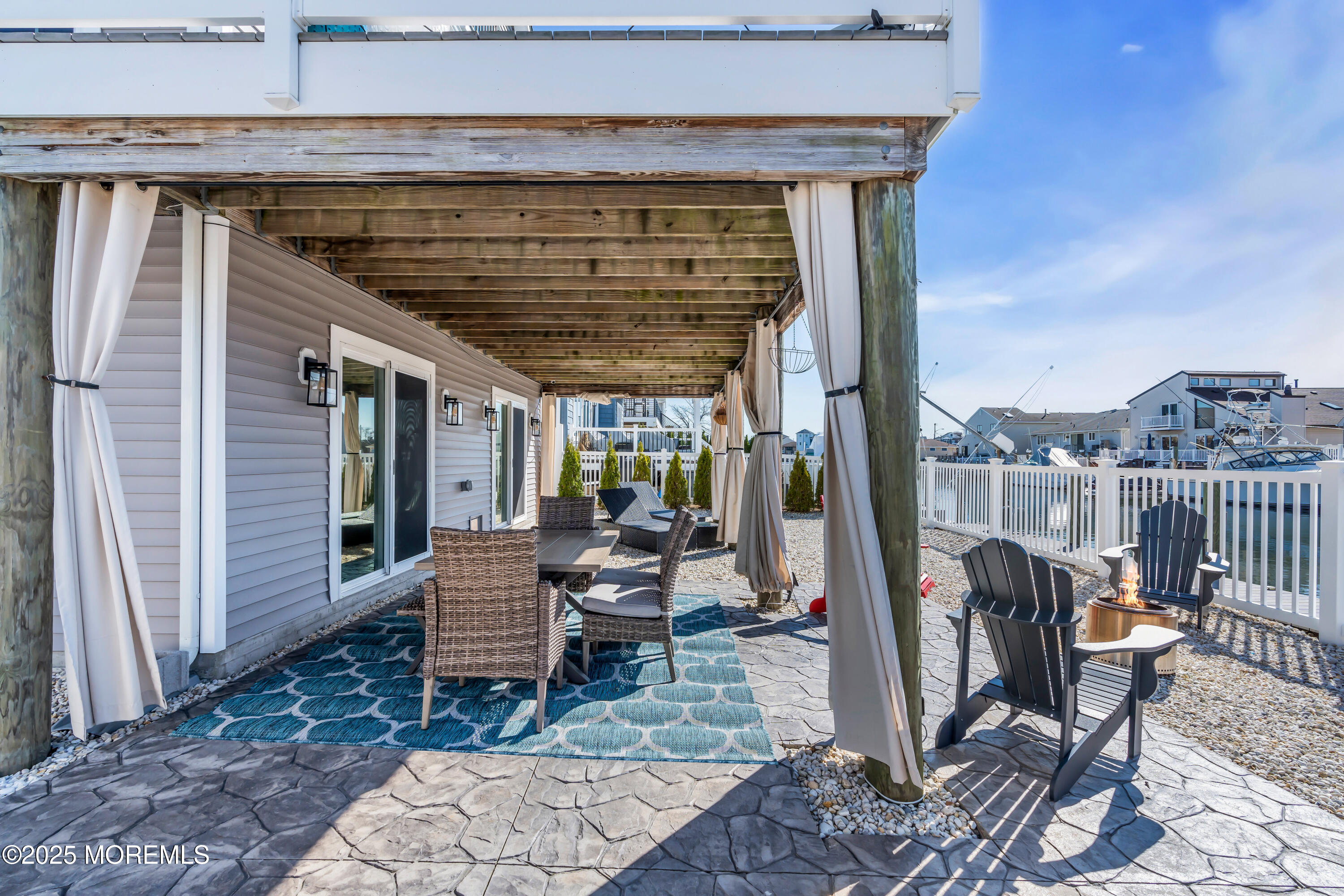50 Pilot Road Toms River, NJ 08753 - Photo 54 of 73 a view of a patio with a table and chairs