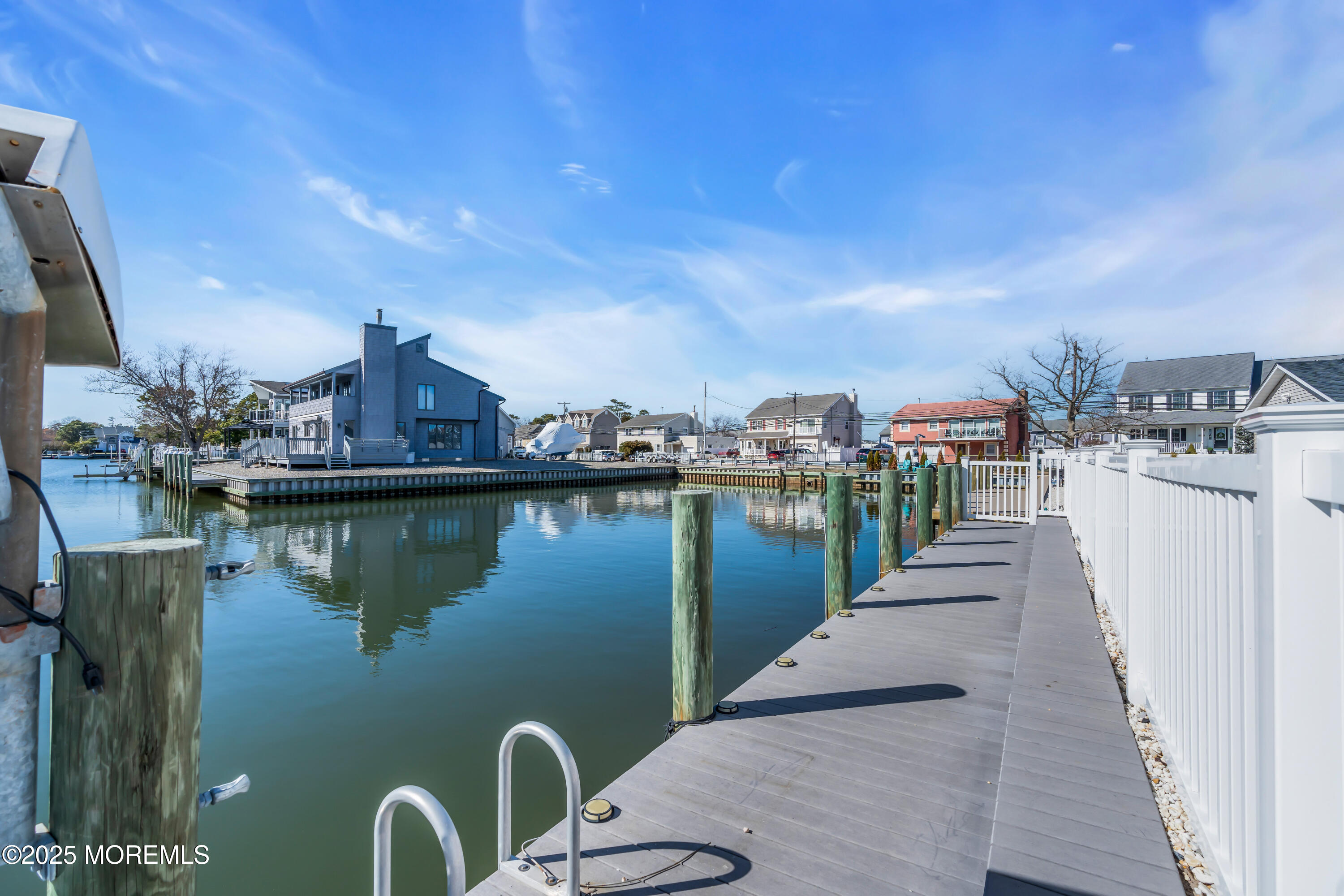 50 Pilot Road Toms River, NJ 08753 - Photo 60 of 73 a view of a lake with boats and trees in the background
