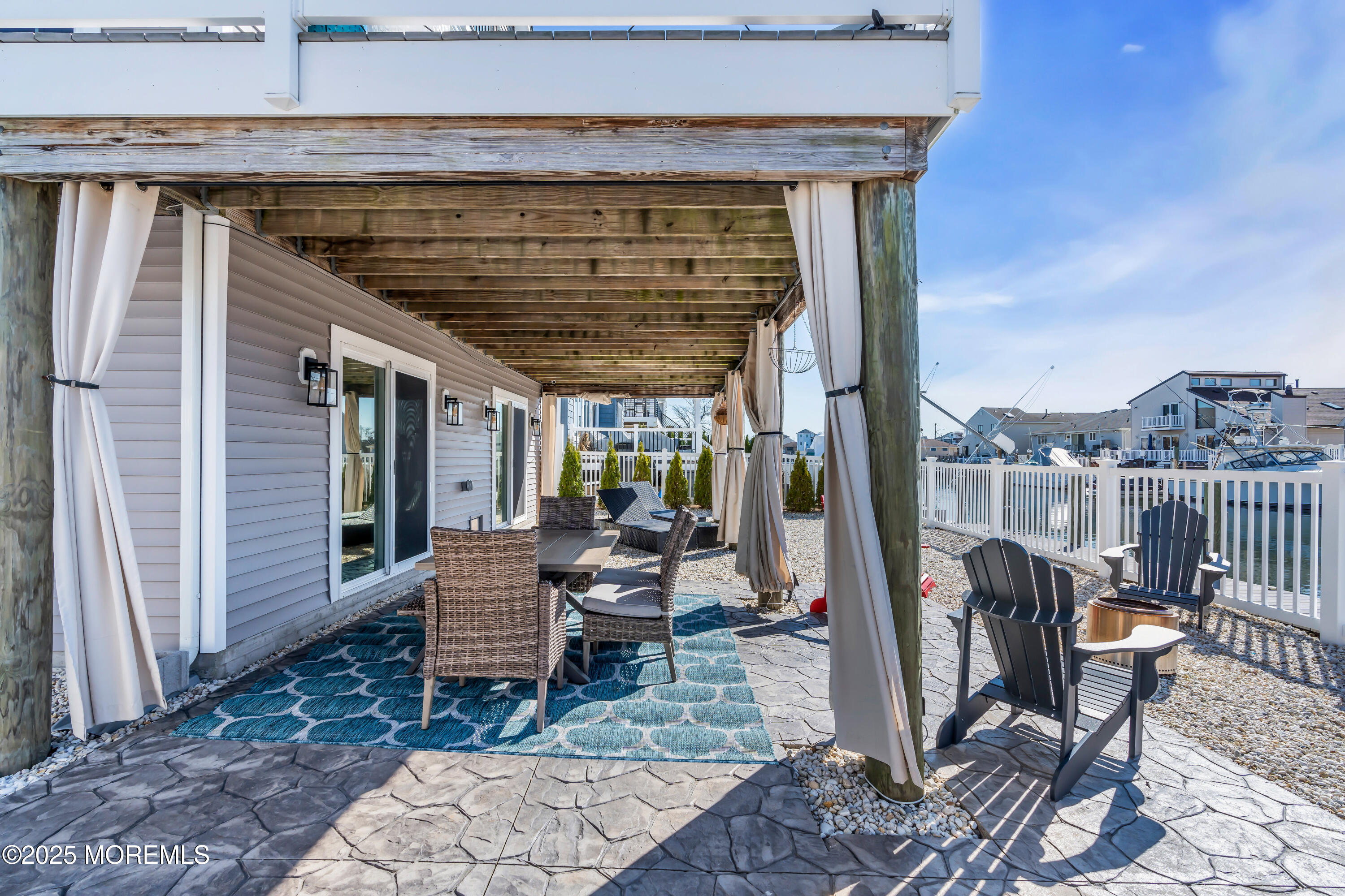 50 Pilot Road Toms River, NJ 08753 - Photo 64 of 73 a view of a patio with a table and chairs