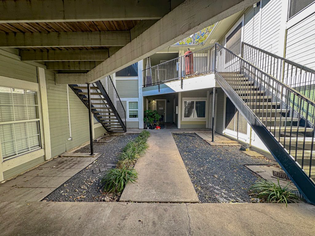 4500 Witham Lane, Unit 101 Austin, TX 78745 - Photo 26 of 27 Doorway to property with a patio and a deck