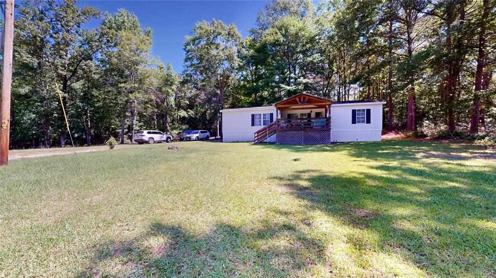670 Arbin Culpepper Road Jonesboro, LA 71251 - Photo 17 of 17 a view of a house with a yard and tree s