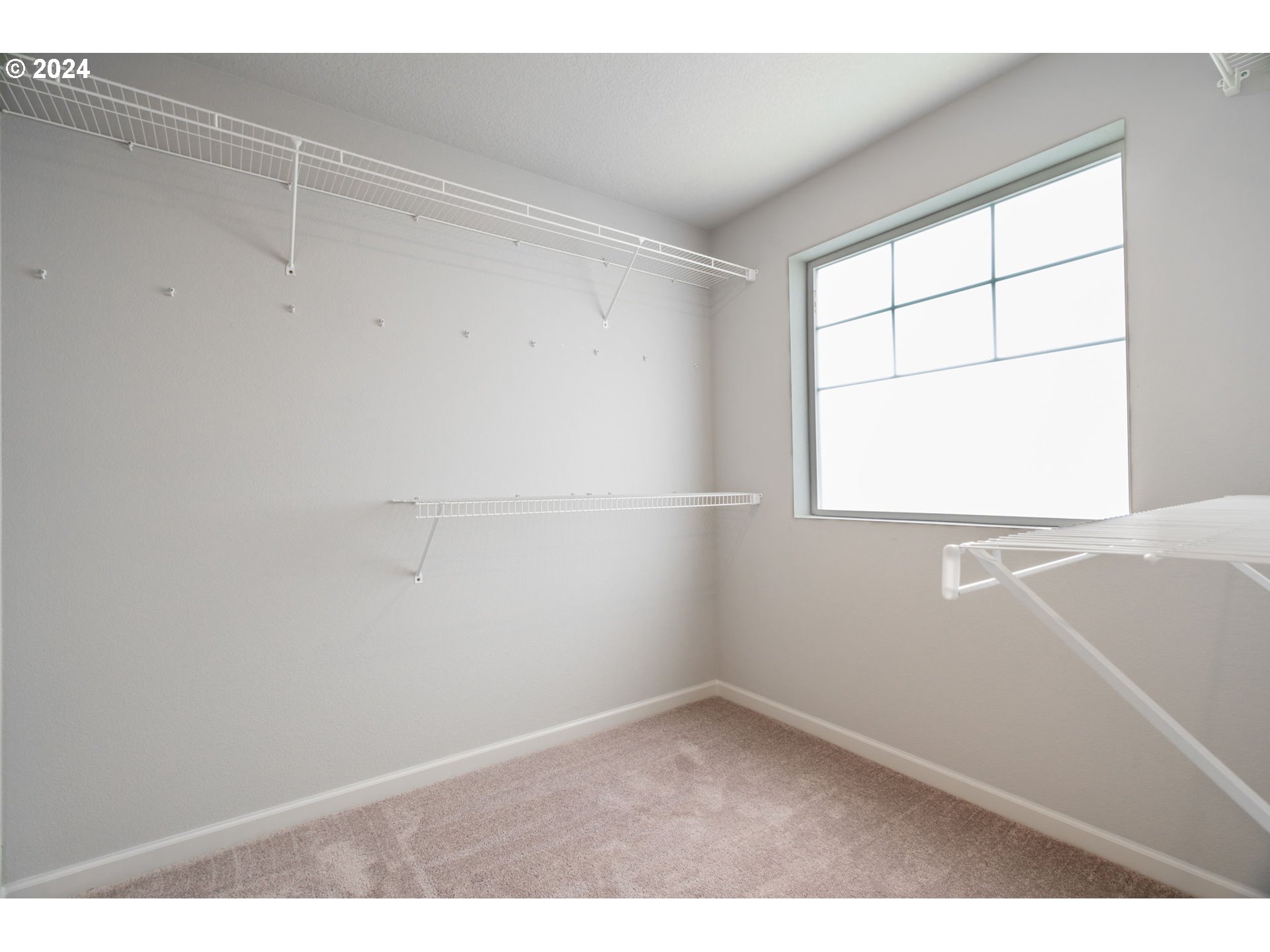 235 Walnut Street Mount Angel, OR 97362 - Photo 14 of 25 a view of an empty room with a window