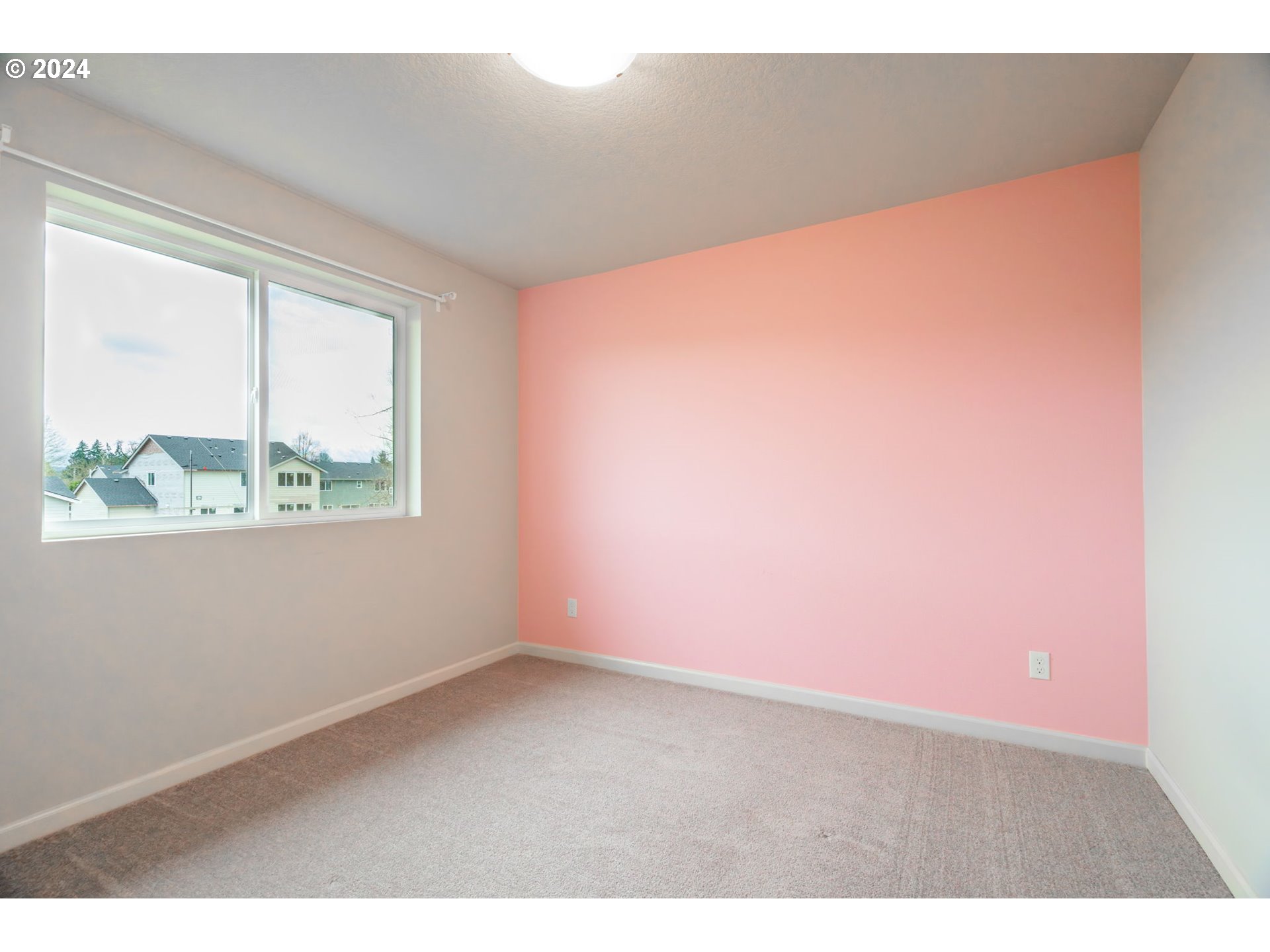 235 Walnut Street Mount Angel, OR 97362 - Photo 20 of 25 a view of an empty room with a window