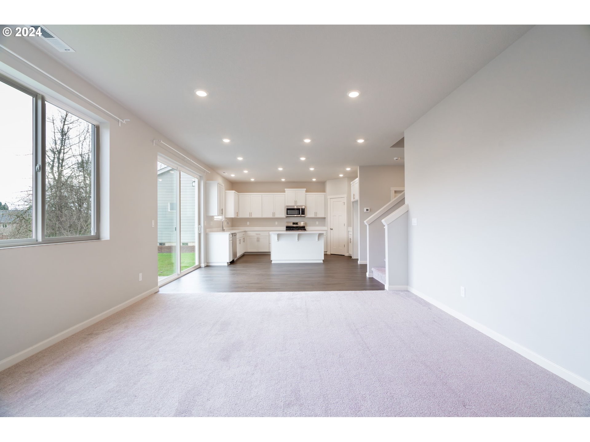 235 Walnut Street Mount Angel, OR 97362 - Photo 8 of 25 a view of a living room with a large window