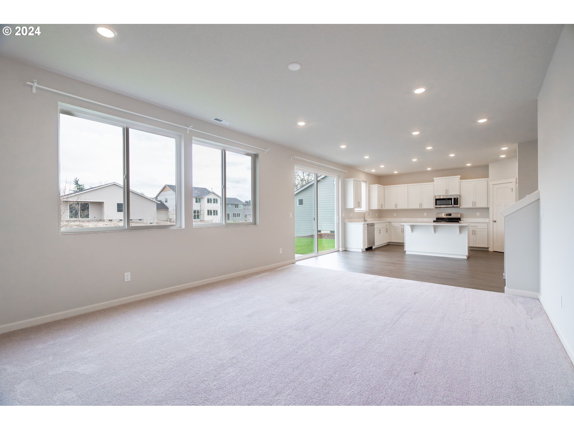 235 Walnut Street Mount Angel, OR 97362 - Photo 9 of 25 a view of an empty room with a window
