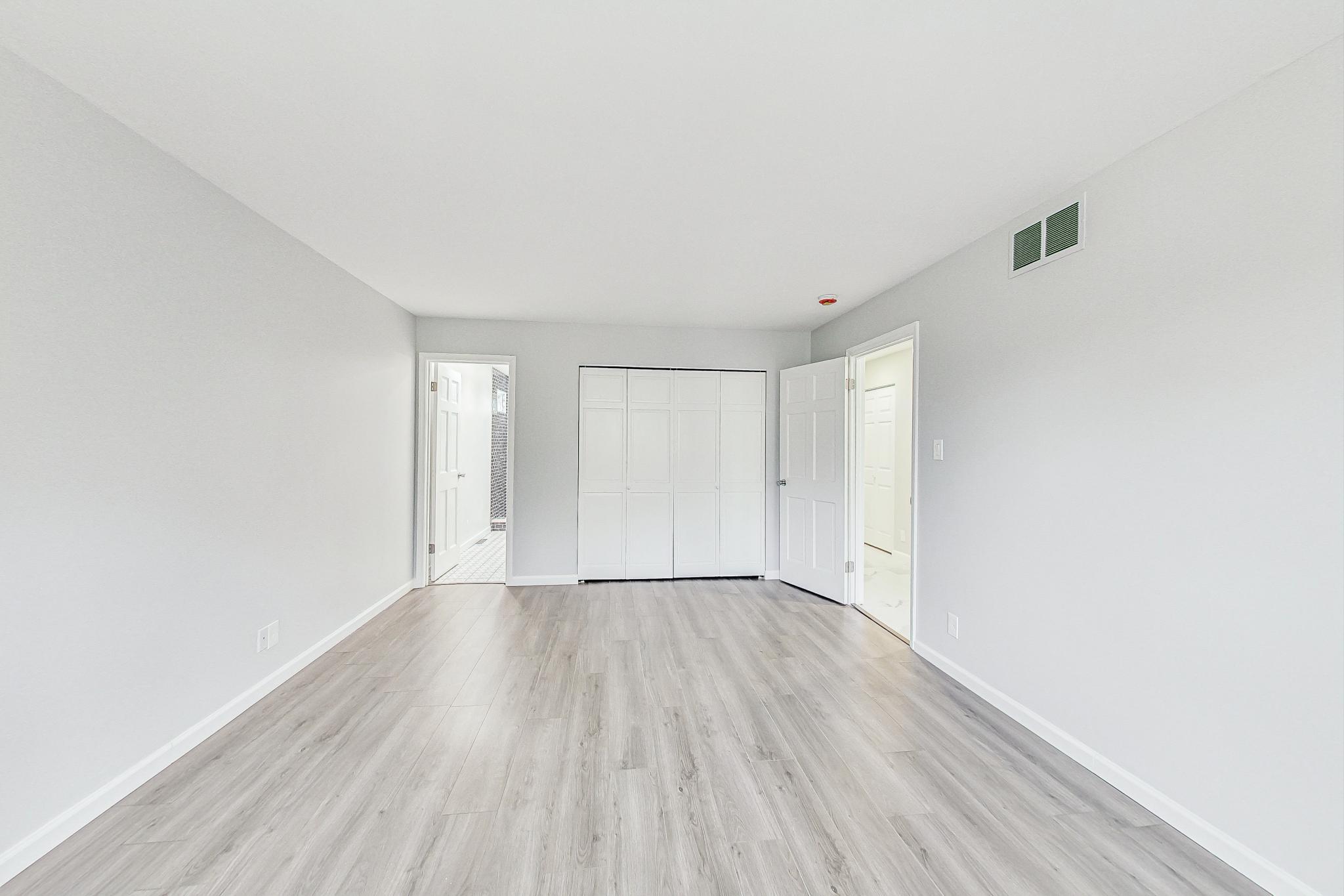 22 Chrismar Road Ogden Dunes, IN 46368 - Photo 16 of 26 a view of an empty room with wooden floor and a window
