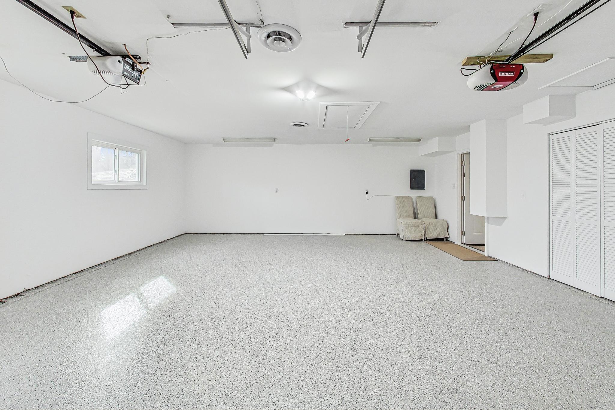 22 Chrismar Road Ogden Dunes, IN 46368 - Photo 21 of 26 a view of a garage
