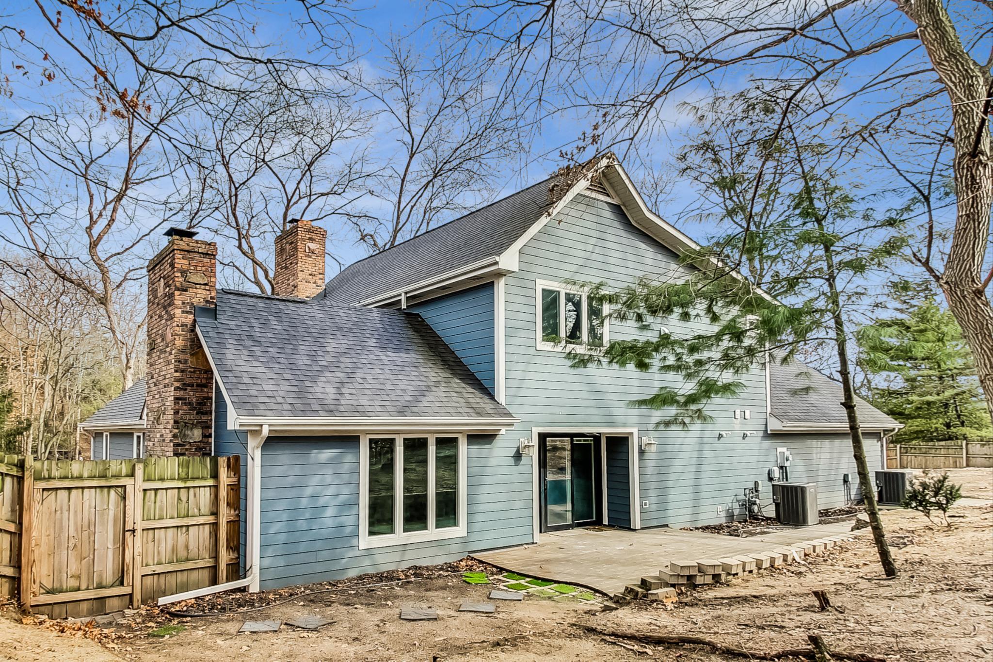 22 Chrismar Road Ogden Dunes, IN 46368 - Photo 22 of 26 a front view of a house with a yard